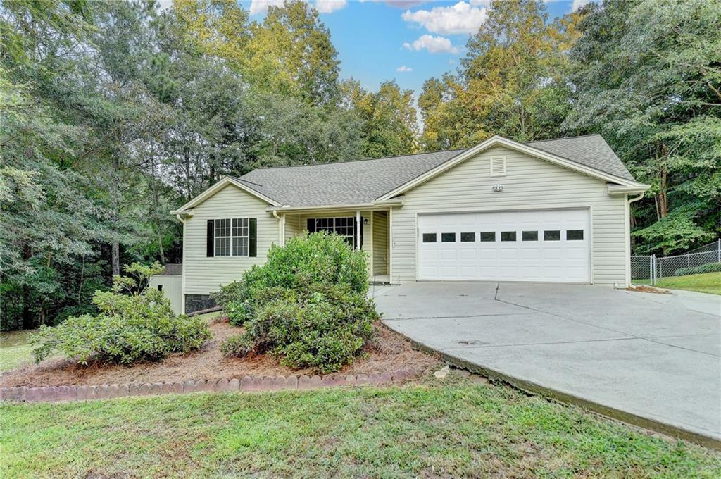 Renovated & Ready to Move Into * Fantastic Location & Hard to Find Low Maintenance Ranch Home on .75 Acre Private Wooded Lot * No HOA * Vaulted Great Room Opens to the Eat-in Kitchen w/ Fresh Painted White Cabinetry & Butcher Block Island * Newer Dark Stainless Steel Appl * Owners Suite w/ Trey Ceilings & Bay Window * New Flooring Throughout * Fresh Interior Paint * Tile Baths * Large Screened Porch Overlooks the Private Backyard & Firepit ~ Ready for Some Fall Outdoor Living & Entertaining * Fenced Backyard/Dog Area * Outbuilding Stays * Roof is Approx 6-7 Yrs Old * HVAC Approx 7-8 Yrs Old * Walk in Crawl Space * Convenient to I-85 and Located Just Minutes to Downtown Braselton, New Kroger, New Publix, Restaurants & Shopping!!
