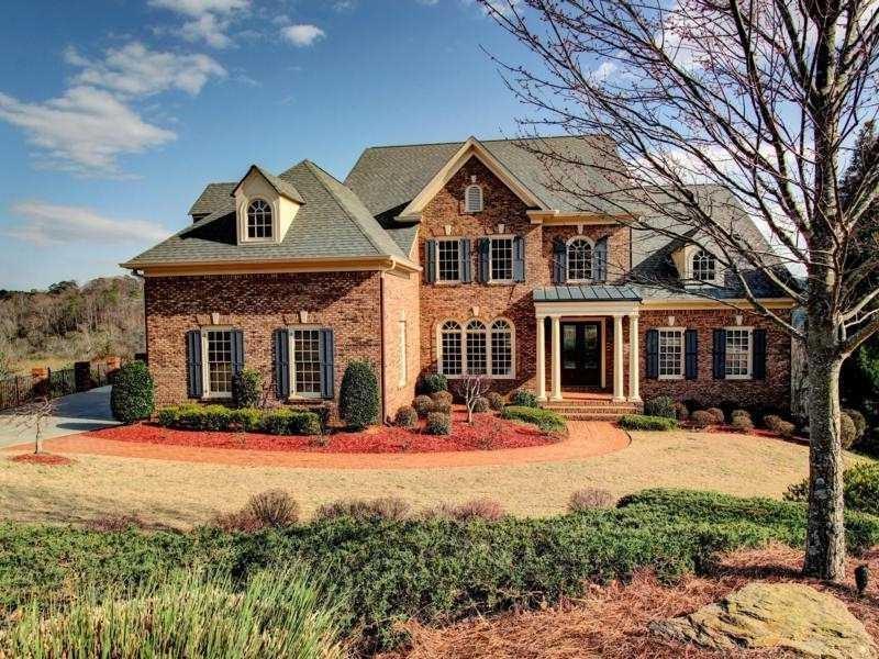 Million dollar view. 3 spacious levels of living. Beautifully finished home offers formal entry, living room and dining room. Large open kitchen with keeping room, breakfast area overlooking Chattahoochee River valley and walk-in pantry. Grand Primary suite on main. Four bedrooms upstairs, each with its own bathroom, plus study nook. Terrace level offers media room, exercise room with shower and sauna plus another bedroom with private bath.