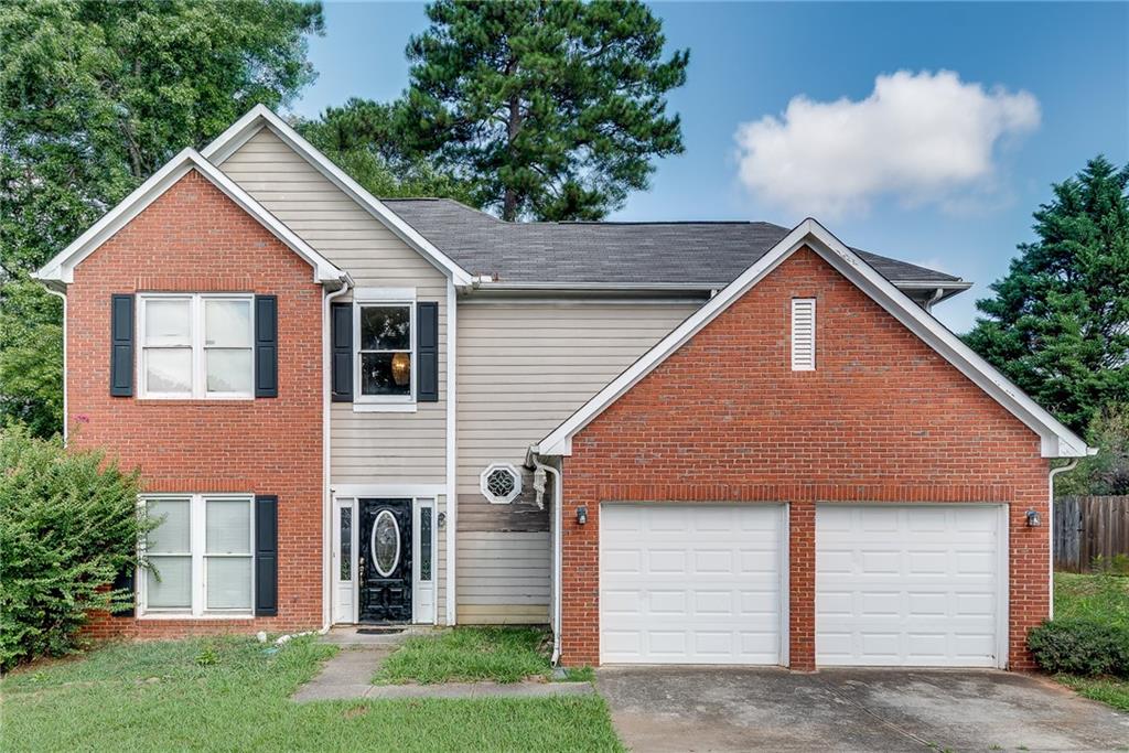 Rare opportunity to own a spacious 3-bedroom, 2.5-bath home in Lawrenceville, GA—a hidden GEM for investors or buyers ready to renovate and add value. Nestled on a generous lot in a quiet neighborhood, this two-story property features a separate family room and living room. Formal dining room. Kitchen with granite countertops, island, pantry, and tiled floors. Breakfast area with a spacious living room, featuring a cozy fireplace and vaulted ceilings. Spacious master suite with tray ceilings. Master bath with double granite vanity. Separate tub and shower. Laundry is located downstairs. The home needs TLC and is being sold as-is, offering excellent potential for customization. Conveniently located off of Cruse Rd. Minutes away from Pleasant Hill, HWY 29, I-85, malls, parks, shops, and more. Don’t miss your chance to transform this true GEM into something extraordinary.