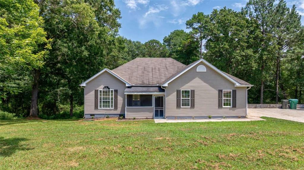 Welcome to 412 Ellerbe Drive, a beautifully updated 4-bedroom, 2-bath ranch nestled on a peaceful and private 1.26-acre lot in the heart of charming Statham, Georgia. This home offers the perfect blend of modern updates, functional space, and an unbeatable location all at an exceptional value. As you step inside, youll immediately notice the fresh, light-filled interior with LVP flooring that flows throughout the home, giving it a clean and contemporary feel. The living room features vaulted ceilings and a cozy fireplace, creating an open and inviting space for both relaxing and entertaining. Both bathrooms have been fully renovated with stylish, modern finishes, and the kitchen is a standout with granite countertops, stainless steel appliances, and a stunning herringbone tile backsplash making meal prep both functional and inspiring. French doors lead you to a freshly renovated back deck that overlooks your wooded backyard oasis, perfect for grilling, entertaining, or simply enjoying the peaceful sounds of nature. A brand-new HVAC system is currently being installed, providing energy-efficient comfort and peace of mind for years to come. Location-wise, you truly get the best of all worlds: just minutes away, downtown Statham offers small-town charm with local coffee shops, boutiques, and community events; a short drive takes you to Winder for larger shopping centers, dining options, and medical facilities; and for those craving the energy and entertainment of city life, Athens, Georgia home to the University of Georgia and a nationally recognized music, arts, and dining scene is less than 20 minutes away, offering everything from Bulldogs football games to live music, eclectic restaurants, and historic downtown charm. 412 Ellerbe Drive is coming soon and offers the space, updates, and lifestyle youve been waiting for stay tuned, this is one youll want to see in person!