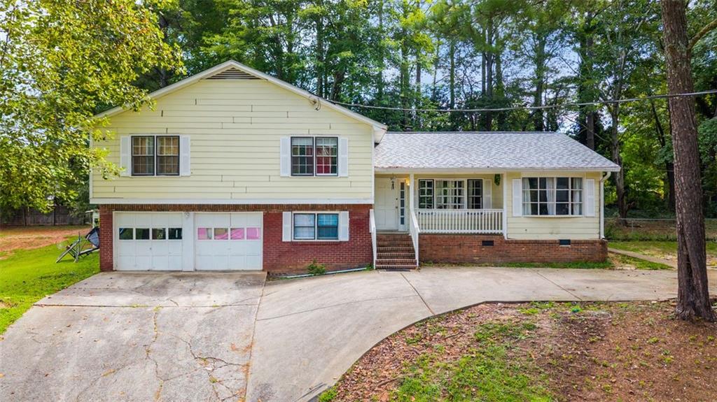 Welcome to this beautifully designed home nestled in a serene cul-de-sac in one of Norcross’s most desirable neighborhoods. This spacious residence features a massive driveway with ample parking, a two-car garage, and tremendous curb appeal. Step inside to discover a large open layout that seamlessly connects the kitchen and family room—perfect for entertaining or enjoying quality family time. The kitchen boasts a central island, modern appliances, and generous cabinet space, making it the heart of the home. All bedrooms are spacious and inviting, providing plenty of room for relaxation. With natural light flowing throughout, high ceilings, and a layout that maximizes functionality, this home offers comfort, style, and value. Don’t miss the opportunity to own this gem in a quiet, well-maintained community—schedule your showing today!