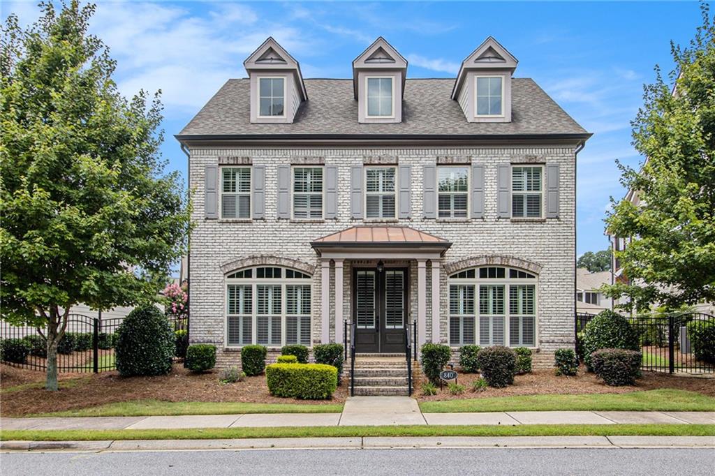 Don’t miss this rare opportunity in one of the area’s most desirable locations! Enjoy an Alpharetta address with the benefit of low Forsyth County taxes, highly rated schools, and a gated swim/tennis community. Perfectly positioned just minutes from Avalon, Halcyon, the new GA-400 access points, Big Creek Greenway, and the upcoming Gathering development/arena for endless dining, shopping, and recreation options. This home features one of the neighborhood’s most generous floorplans with 4 bedrooms and 3.5 baths. The main level includes a luxurious owner’s suite with a spa-inspired bath and two custom walk-in closets. Upstairs offers three additional bedrooms, two full baths, a flexible loft area, and a large unfinished bonus space ideal for a playroom, gym, or media room.