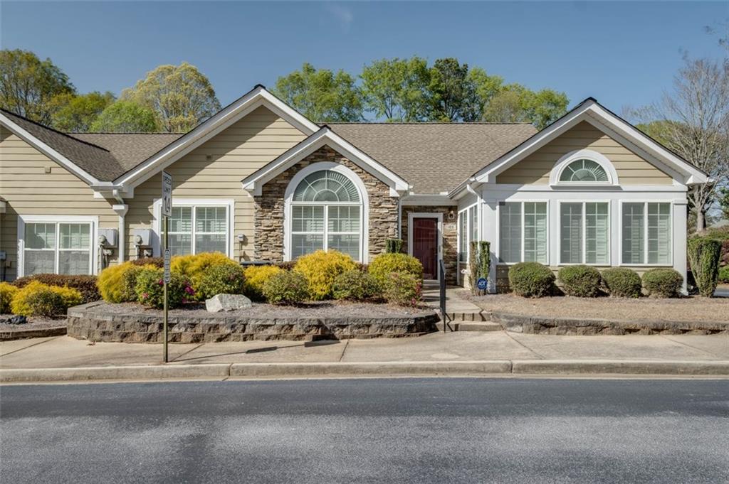 Wonderful highly sought after 55+ Community Condo of Villas of Gingercake. This unit has beautiful upgrades, including hard wood floors, granite counter tops, plantation shutters and french doors.
Open floor plan with 2 BR's and 2 full baths, sun room, fireplace in family room. Third room is used as an office/exercise room and cannot be classified as a bedroom because there is no closet. Walk in laundry room with plenty of space. Huge master bedroom with attached bathroom with double vanity and walk in closet.
Ideal location close to Piedmont Hospital, downtown Fayetteville, restaurants and shopping. Property is being sold AS-IS