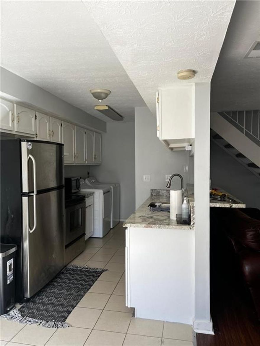 Make this 3 bedroom 1 bath condo your own today. Close to everything which include: Kennesaw State university, shopping, restaurants, and Truist Park by The Battery.