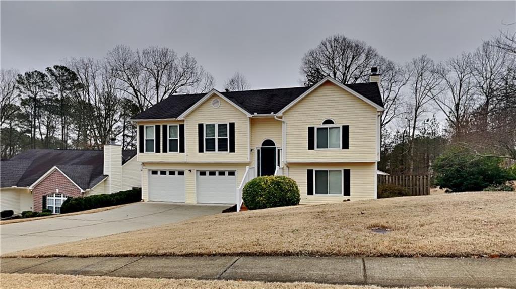 This stunning split-level home offers a perfect blend of modern updates and functional design featuring 5 bedrooms 3 baths and a two car garage with additional storage area for added convenience. This residence has all the modern comforts you're looking for in a dream home ! It has new carpet, hardwood flooring, family room with a fireplace, new interior paint, and luxury vinyl flooring. Your outdoor entertaining and relaxation area has an above ground pool, jacuzzi and 2 decks perfect for when it's time to unwind. Inside you'll find an updated kitchen with granite countertops, new stainless steel dishwasher, stove and microwave. In the primary suite, the bathroom has a tile shower with double glass doors for added luxury and double vanities. This one won't last long ! Come check it out and place your offer !