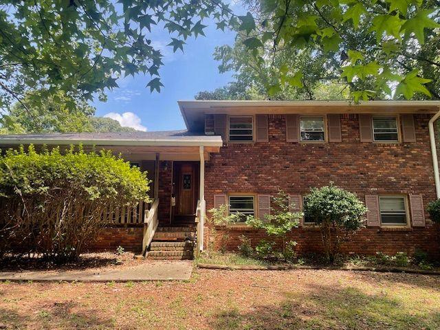 This home is perfect for savvy investors, first-time buyers with vision, or anyone looking for a rewarding renovation project. Featuring original hardwood floors, spacious living areas, and a functional layout, this property offers the perfect canvas to bring your dream home or next investment to life. The exterior boasts timeless brick construction, a large front yard, and a flat backyard ideal for entertaining, gardening, or future expansions. Located just minutes from Southlake Mall, major highways (I-75 and I-285), and Clayton State University, you'll enjoy quick access to shopping, dining, schools, and parks