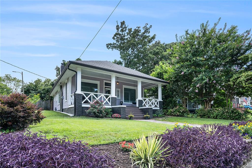 Welcome to the best house on the block! This beautifully renovated 3-bedroom home is nestled on a spacious corner lot in the sought-after and historic Frog Hollow district of East Point. Located in a well-established, non-HOA neighborhood, this home offers timeless charm with modern upgrades. From the freshly painted exterior and immaculate landscaping to the inviting, newly renovated front porch, every inch of this home exudes curb appeal. Step inside to discover elevated 10+ foot ceilings, stylish updated lighting, and two decorative fireplaces that add warmth and character throughout. The heart of the home is the fully renovated kitchen, perfectly designed for both everyday living and entertaining. Out back, enjoy a huge fenced-in yard with a private rear entrance. The left side of the yard is a true urban oasis, thoughtfully dedicated to a flourishing garden complete with herbs, vegetables, fruit trees, and pollinator-friendly plants, perfect for the green thumb or nature lover. Located just minutes from restaurants, shops, MARTA, and all that thriving East Point has to offer, this home is a rare blend of charm, convenience, and lifestyle. Don't miss your opportunity to own this one-of-a-kind beauty in Frog Hollow!