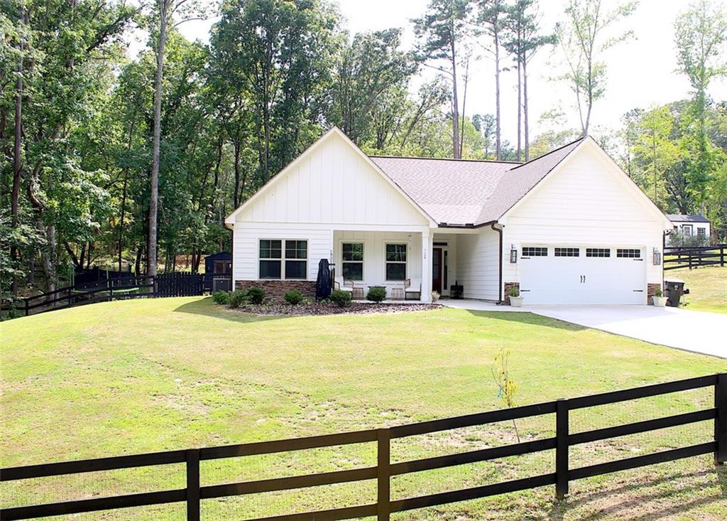 WELCOME HOME to your Beautiful RANCH/CRAFTSMAN STYLE HOME!! One Level living at it's best! OVERSIZED, main level Owners Suite, with Office, Nursery, SITTING ROOM or Workout space. You will love it! Granite countertops in Kitchen and both Baths!
Home offers a covered FRONT and BACK PORCH. Perfect for RELAXING and enjoying your morning coffee. The backyard has room for a GARDEN, HAMMOCKS, and even a pool! Owner fenced the front and backyard, adding a gate at the front driveway.
Home is less than 1 mile from Mulberry Rock Park, offering a play ground, picnic tables and WALKING TRAILS! Minutes to shopping, restaurants and Downtown fun.
Schedule your tour of this great home, today!