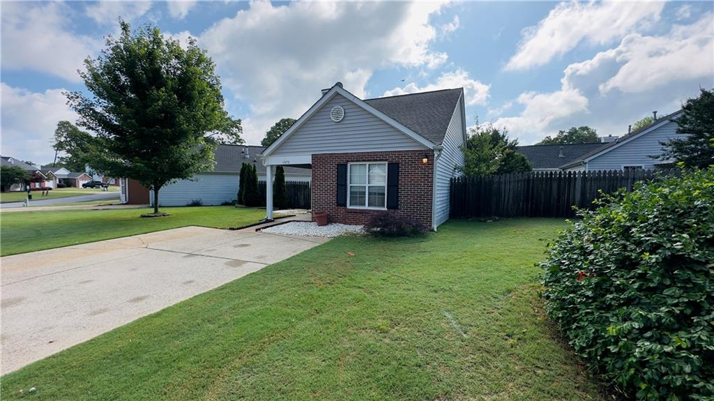 Charming 2-bedroom, 2-full bath cottage features an Open/vaulted floor plan, granite countertops, stainless steel appliances, a new water heater, and Air conditioning unit, private fenced backyard. Front lawn maintenance is included in HOA fees.