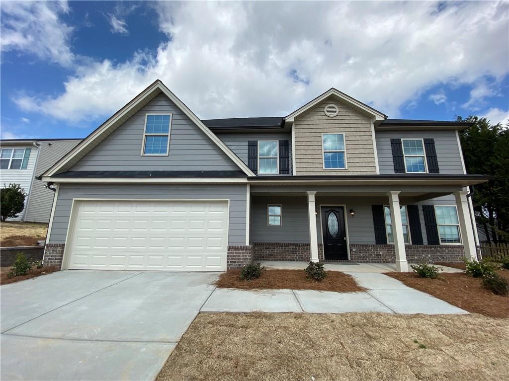 Welcome to this beautiful home. You will be the first family to enjoy the house. 4 spacious bedrooms, 2.5 Baths. Main floor kitchen has stainless steel sink, stainless Steel Range, Dishwasher, and Microwave. Kitchen Island overlooks the dining area and family room with gas log fireplace. Master suite with private baths, separate tub & shower, double vanities, & a walk-in huge closet. Large front and back yard. 2 car garage. Small Pets welcome. Non refundable pet fee $700 per pet. Landlord provides refrigerator, washer and dryer. Move-in ready!