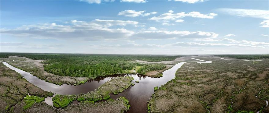 Rare Coastal Development Opportunity with River Access – ±2,975 Acres in Glynn County. An exceptional opportunity awaits with Longwood, a thoughtfully planned ±2,975-acre residential development in Brunswick, Georgia. With direct frontage on the Little Satilla River, 1,312 vested residential units, and vast conservation acreage, this legacy property offers the perfect balance of natural beauty and development potential. Tucked among tidal marshlands and mature woodlands, Longwood has been carefully designed with sustainability in mind. More than a decade of planning has resulted in recorded conservation easements, architectural guidelines, and POA-owned access roads already in place. Public water is available through JWSC, and onsite septic is permitted under an existing variance. A private community dock with a boat lift provides river access, with a second dock sit available pending DNR approval. The remaining acreage includes legally vested entitlements and established roadways, offering a clear path for continued development. Originally entitled for over 4,400 units, the development was scaled back in 2017 to preserve the natural landscape while delivering a more intentional, conservation-focused community vision. Whether you're a developer seeking a large-scale, eco-conscious project or an investor looking for long-term potential in a high-demand coastal market, Longwood stands out as a rare and valuable offering. Contact Josh Reeves for detailed plans, entitlements, easement documentation and site visits.
