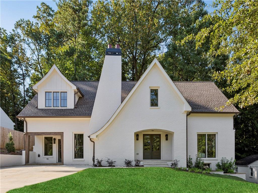 Welcome to a stunning 5-bedroom, 4.5-bath custom home that has been completely reimagined from the ground up. Stripped to the studs and rebuilt with a thoughtfully designed second level, this residence combines timeless craftsmanship with modern elegance. Step inside to discover an open-concept floor plan highlighted by hardwood floors throughout and top-to-bottom customization. The heart of the home is the chef’s kitchen, featuring a large island, premium JennAir appliances, and seamless flow into the living and dining areas, perfect for both everyday living and entertaining. Retreat to the luxurious primary suite, complete with separate his-and-hers walk-in closets and a spa-like ensuite bathroom boasting designer finishes, a soaking tub, and an oversized shower. Generously sized secondary bedrooms and well-appointed baths provide comfort and flexibility for family or guests. Located in one of Atlanta’s most desirable pockets, this home offers quiet residential living with quick access to Buckhead’s premier shopping, dining, and entertainment. Enjoy the convenience of being minutes from top schools, major highways, and some of the city’s best lifestyle amenities.