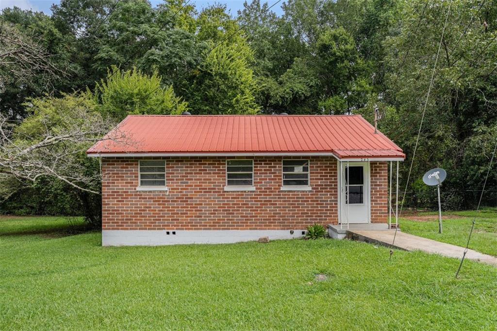 This is your Upgraded Cozy Retreat! Step into charm and comfort with this freshly updated 3-bedroom, 1-bath brick beauty! Perfectly located in a quiet, friendly neighborhood, this home is an ideal rental for anyone looking for easy living without breaking the bank. You'll love the classic curb appeal and private backyard – perfect for relaxing, entertaining, or just soaking up some sunshine. Inside, enjoy a bright, functional layout featuring a newly upgraded kitchen and bathroom that add a modern touch to this timeless home. The kitchen is ready for your culinary adventures, while the upgraded bathroom offers a stylish and refreshing space to unwind. Each bedroom provides a cozy haven, just right for rest and relaxation. Great investment or first-time buyer opportunity. Don't miss it!