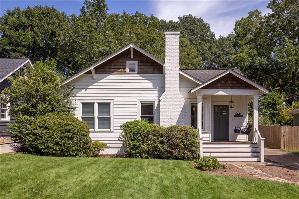 Discover timeless charm with modern convenience in this beautifully renovated 3-bedroom, 2-bathroom bungalow on one of the best streets in Howell Station. Overflowing with curb appeal, this home blends historic character with thoughtful updates for today’s lifestyle. Inside, you’ll find gleaming hardwood floors, a fully renovated kitchen, and an expansive primary suite featuring a spa-like bath with dual vanities, a walk-in shower, and a spacious walk-in closet. A well-designed mudroom with built-in shelving, laundry, and space for a dedicated desk adds both style and functionality, creating the perfect hub for everyday living.
Thoughtful design details continue throughout, including custom bookcases in the dining area and in one of the bedrooms: functional and aesthetic, they provide the perfect space for the avid reader or for showcasing treasured collections. Step outside to a fully fenced, flat backyard with a deck built in 2023, ideal for entertaining, gardening, or a place for pets to play. A private driveway provides off-street parking just outside your front and back door.
Recent upgrades, including a new HVAC system and hot water heater (both replaced in 2024), ensure comfort and efficiency for years to come. Located just moments from the Atlanta BeltLine and the vibrant Westside’s dining and shopping scene, this home offers the perfect balance of neighborhood charm and urban access.