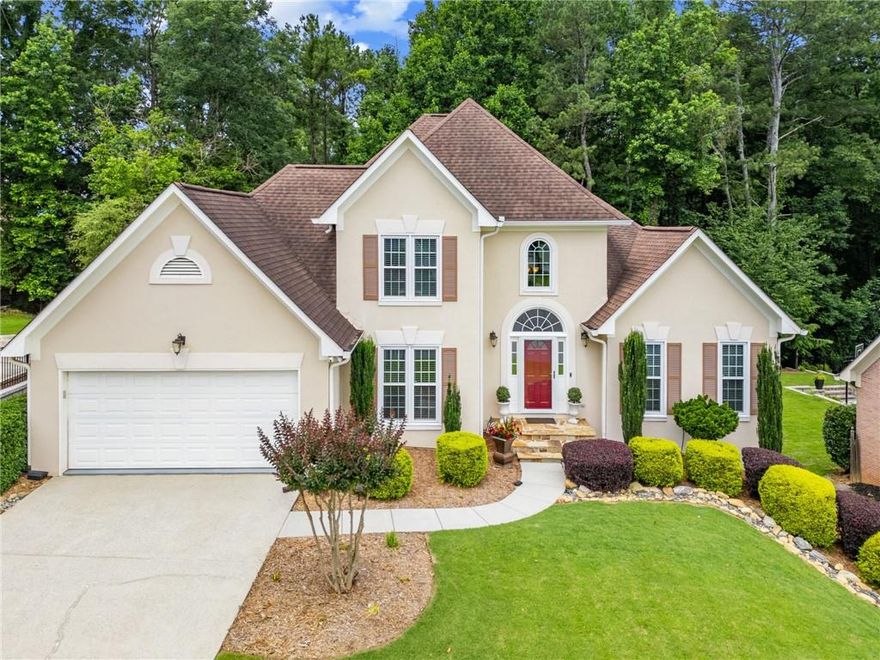 Charming 3-Bed, 2.5-Bath Home with Master on Main, Finished Basement,  and Award-Winning Curb Appeal. Welcome to this beautiful Medlock Bridge home, perfectly situated in the heart of Johns Creek / Alpharetta. Featuring the convenience of a main-level master suite, this home effortlessly blends modern / updated features, comfort, style, and functionality. Step outside to experience the beauty of the custom 425 sq. ft. cedar screened-in porch, ideal for year-round relaxation and entertaining. Crafted with care, this stunning space brings the outdoors in while offering protection from the elements. Freshly painted on the back and side exteriors, the home offers a crisp, well-maintained look that enhances its already impressive curb appeal. Energy efficiency and comfort are assured thanks to Low-E double pane windows with a limited lifetime transferable warranty, providing peace of mind for years to come. Enjoy the pride of ownership with a yard that has been recognized with the “Yard of Excellence” award by the Medlock Bridge HOA three years in a row, showcasing meticulous landscaping and attention to detail. Don’t miss the opportunity to own this exceptional home that combines thoughtful upgrades, award-winning charm, and an unbeatable location. Schedule your private tour today