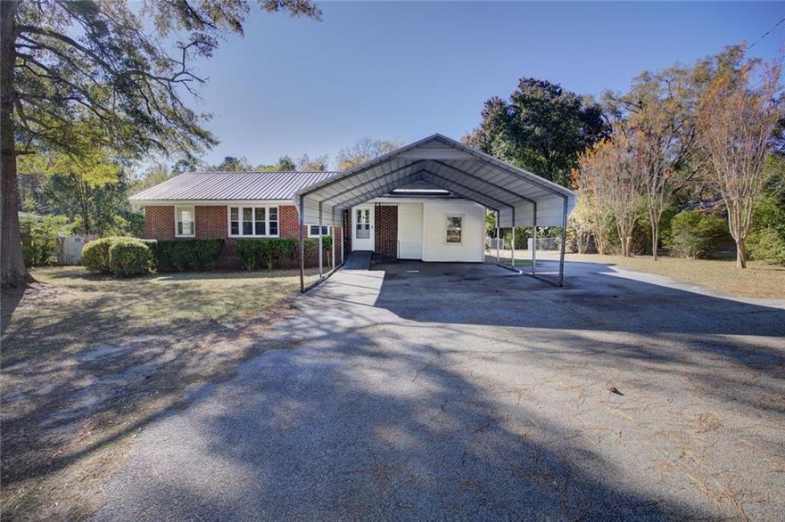 Discover the potential in this charming 4-bedroom, 2-bath ranch 4 sided brick home nestled on a large private lot. Perfect for first time home buyers. Freshly painted and real hardwood floors which have just been redone with a beautiful walnut finish. Enjoy your morning coffee on the private screened in back porch overlooking the large backyard which is completely fenced in and perfect for gatherings, play, or gardening. Oversized storage shed at the back of the property for all of your storage needs. Conveniently located near schools, shopping, dining, and I-20 for quick access to the city. A wonderful opportunity for homeownership.