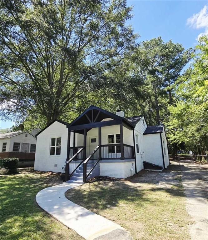 Welcome to this beautifully renovated 3bd/ 1 bath ranch located in the heart of East Point! This move-in ready home features new LVP flooring throughout, all new windows, doors, light and plumbing fixtures. Enjoy a brand-new kitchen with granite countertops and stainless steel appliances (refrigerator, dishwasher, stove and microwave), and the bathroom has been updated with tiled shower walls and flooring plus new granite top vanity. Exterior highlights include a brand new roof, new siding and fresh paint. Conveniently located near downtown Atlanta, the airport, and major highways. Don't miss out on this move-in ready gem!