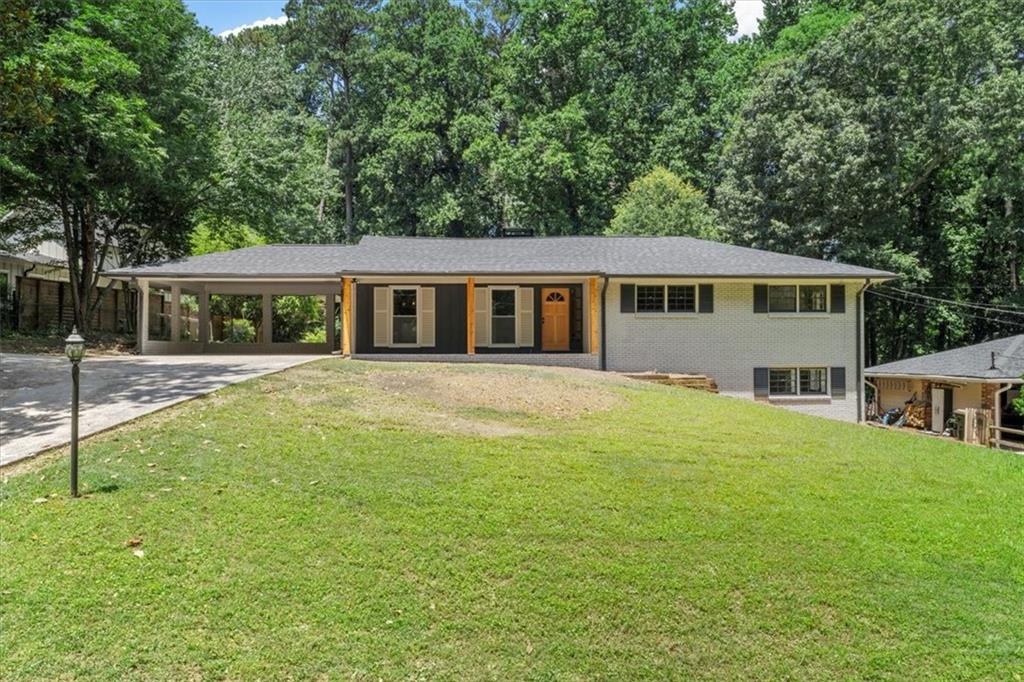 Charming Renovated Ranch in Prime Sandy Springs Location - Zoned for Heards Ferry Elementary! Welcome to this beautifully updated 4-bedroom, 3-bathroom ranch-style home over a partially finished basement, perfectly situated in one of Sandy Springs' most desirable neighborhoods. Zoned for the highly acclaimed Heards Ferry Elementary School, this move-in-ready gem offers the ideal blend of comfort, convenience, and modern upgrades. Step inside to discover a fully renovated interior featuring all-new flooring, fresh paint throughout (interior and exterior), updated light fixtures, and a brand new roof. The spacious, light-filled layout includes a completely updated kitchen with modern finishes, sleek countertops, and plenty of storage perfect for everyday living and entertaining. Enjoy the oversized sunroom, ideal for relaxing year-round, and step out onto the brand new deck overlooking a large, private backyard. Don't miss the charming "she shed," offering a versatile space for a home office, studio, or retreat. All bathrooms have been stylishly renovated with contemporary finishes. With a location just minutes from everything Sandy Springs has to offer shopping, dining, parks, and top-rated schools this home truly has it all.