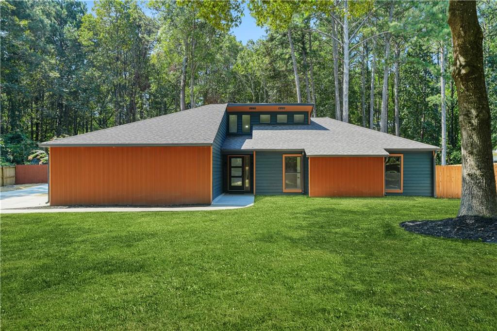 Welcome to 105 Shadowood Lane. This spacious (4) four-bedroom, (3) three-bathroom ranch home is the perfect place to build memories and is a truly exceptional home in the heart of Peachtree City. This fabulous home resides in a neighborhood known for its top-notch schools and lively community-offers you a lifestyle full of convenience and charm. The heart of this home is undoubtedly the spacious great room and perfect for gathering with loved ones. No detail was spared, from the elevated ceilings, bright kitchen with its white cabinets, brand new appliances, wine fridge and sparkling quartz countertops. The kitchen is a chef's delight, featuring steel appliances, quartz countertops, and custom cabinetry. Adjacent to the kitchen is a dining area, perfect for quick breakfasts or informal gatherings as well as another space perfect for an office or home school area overlooking the backyard. This stunning home features a spacious great room with a fireplace. This home boasts 2 master en-suites on opposite sides of the home. Additionally, you'll discover a tranquil retreat with two generously sized bedrooms. The en-suites are true oasis, boasting a luxurious bathroom with bowl sinks, and smart toilets. One of the en-suites is wired for bluetooth connectivity. Beyond the interior, the expansive backyard offers a haven for outdoor living. The large space, which is rare for Peachtree City, is perfect to add a pool. Imagine hosting summer barbecues, enjoying a quiet evening under the stars, or letting the kids run free in the spacious yard. The garage is a 2 car garage with a golf cart door. It's about the lifestyle you can embrace in Peachtree City. Imagine yourself exploring the scenic golf cart and beautiful walking trails that run through the community, enjoying a leisurely round of golf at one of the many championship courses, or simply strolling through the charming downtown area with its unique shopping experiences, upscale restaurants, and less than 30 minutes from the Atlanta Airport. 105 Shadowood Lane is more than just a house; it's an opportunity to live the life you've always dreamed of. It's a place where families thrive, memories are made, and where the essence of Peachtree City comes alive. Don't miss your chance to make this beautiful property your own. Don't let this amazing opportunity pass you by! Make 105 Shadowood Lane your new home in one of Georgia's top neighborhoods. Schedule your visit today, and WELCOME HOME. Pictures featuring Grass have been enhanced.