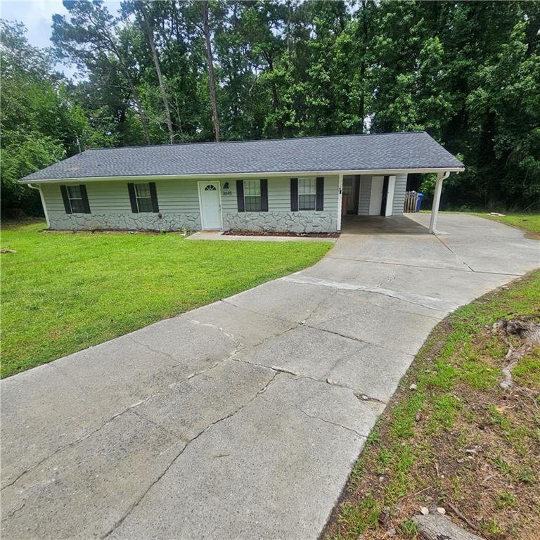 Discover the comfort and convenience of this charming 3 bedroom, 2 bathroom ranch home. Ideally situated on a quiet cul-de-sac in the heart of Snellville. The kitchen features gray cabinetry, and a breakfast nook. The primary bedroom is complete with an ensuite bathroom and closet. Outside, the spacious backyard is a private oasis, with a patio and mature trees safely spaced away from the home, providing a buffer for the direct rays of the sun, and an ideal space for outdoor activities and recreation. Close to shopping, restaurants, Briscoe Park, easy access to Hwy 124 and Hwy 78, and 20 minutes away from Piedmont Eastside Medical.