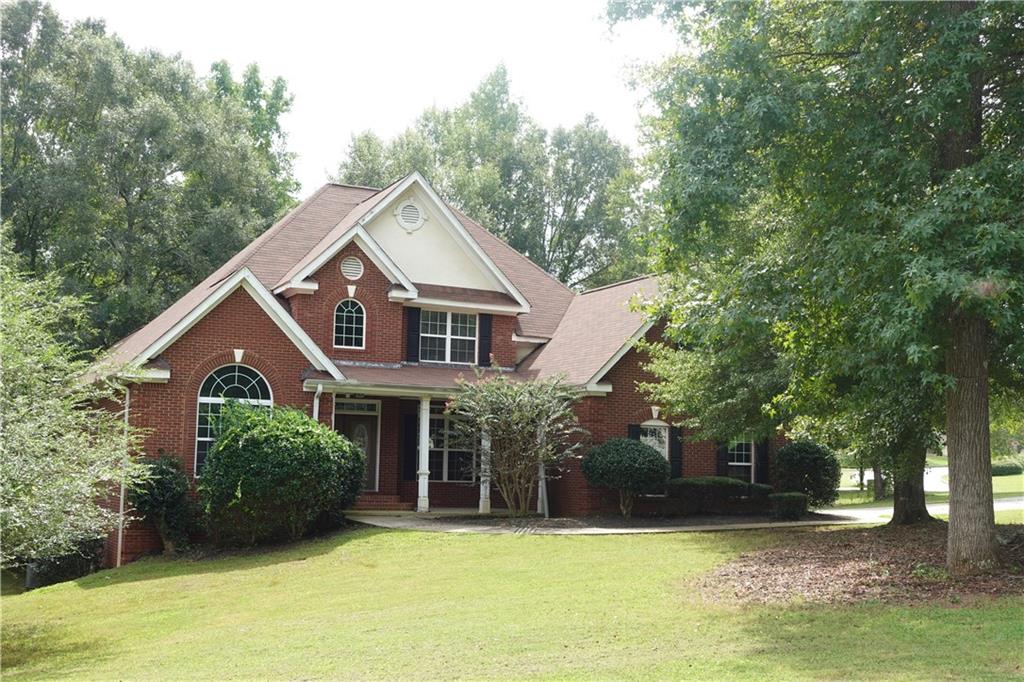 This extraordinary estate is a rare find, offering an unmatched combination of luxury, space, and comfort. This home boasts 5 bedrooms and 4.5 baths and a full basement, providing ample space for family and guests. Enjoy the convenience and luxury of a primary suite on the main level, complete with a private retreat, walk-in closet, and a spa-like ensuite bath. The full, unfinished basement offers endless possibilities for customization, providing space for additional living areas, a home gym, or a workshop. Don't miss the opportunity to make this dream home yours.