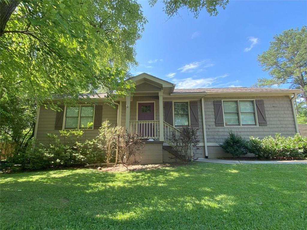 Your Dream Home Awaits in the Heart of Smyrna! This charming 3-bedroom, 2-bathroom home truly has it all — style, space, and an unbeatable location. The covered front porch welcomes you in to an open floorplan with hardwood floors throughout, a cozy living room with gas fireplace & custom built-in shelving, separate dining room and an updated kitchen featuring stainless steel appliances, granite countertops & gas range for cooking. The 2 secondary bedrooms are perfect for kiddos, guests or home office/gym/flex space, and are serviced by a full bathroom. The expansive primary suite, at the rear of the home, includes a large walk-in closet with custom closet system, spacious ensuite bathroom with double vanity, walk-in shower + garden tub, and direct access to the back porch. Outside, enjoy a large fully fenced backyard for privacy and safety — perfect for pets, play, and backyard BBQs. And parking is a breeze with the oversized driveway. A newer HVAC system and tankless water heater offer comfort and on-demand hot water. Location, location, location cannot be beat with close proximity to Smyrna Market Village, restaurants, shopping & a short walk to Tolleson Park. This home isn’t just move-in ready — it’s ready to be loved. Don’t wait, schedule your showing today! (Home is NOT FURNISHED)