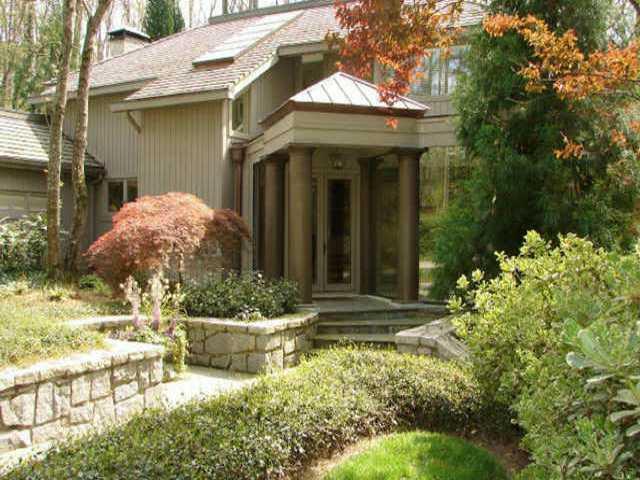 REFRESHING CONTEMPORARY WHICH HAS BEEN TOTALLY RENOVATED. SURROUNDED BY MATURE LANDSCAPING CREATING BEAUTIFUL TRANQUIL AREA ON LARGE CORNER LOT. WONDERFUL 'OUTDOOR ROOMS' PLUS POOL AND SECRET GARDEN.