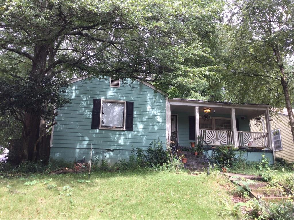 Prime corner lot/location now available in the quiet treetop enclave of north Ormewood Park, a friendly and vibrant East Atlanta neighborhood. Excellent opportunity- within the Beltline overlay district- for renovation/expansion of this solid 1940's bungalow, or a custom build intown modern on an elevated lot with possible seasonal views, from rooftop garden. Within easy access to all of Atlanta, this opportunity offers the right blend of a character and convenience. Excellent walkable neighborhood, just steps to the Atlanta Beltline and a short stroll to Glenwood Park, and East Atlanta Village.