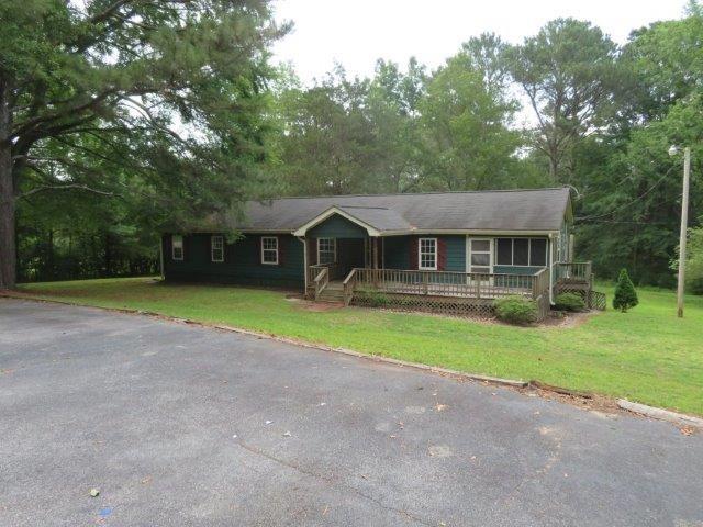 Great opportunity for a 1.56 acre lot! Front deck and screened porch are perfect for relaxing on summer nights! Spacious living room and separate dining room! Breakfast bar between living room and kitchen! Three spacious bedrooms and two full bathrooms! Beautiful lot! Tons of parking space! A must see! Submit your offer today!