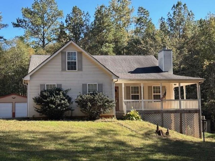 Opportunity knocks! This 3-bedroom, 2-bath home sits on a beautiful and private 5.25-acre lot, offering peace, quiet, and loads of potential. Nestled in a tranquil setting, this property is perfect for investors or buyers looking to customize their dream home with a bit of TLC.

The home features an unfinished basement with tons of potential for added living space, a workshop, or a recreation area. Enjoy the benefits of country living with a private entrance that leads to your new home.

Out back, you'll find a spacious 2-door garage/storage unit, ideal for storing tools, equipment, or converting into a workshop or hobby space.

Whether you're looking to renovate, rent, or create your forever home, this is a rare opportunity to own acreage in a desirable part of McDonough with room to grow and personalize.

Don't miss your chance to invest in potential – schedule your showing today!