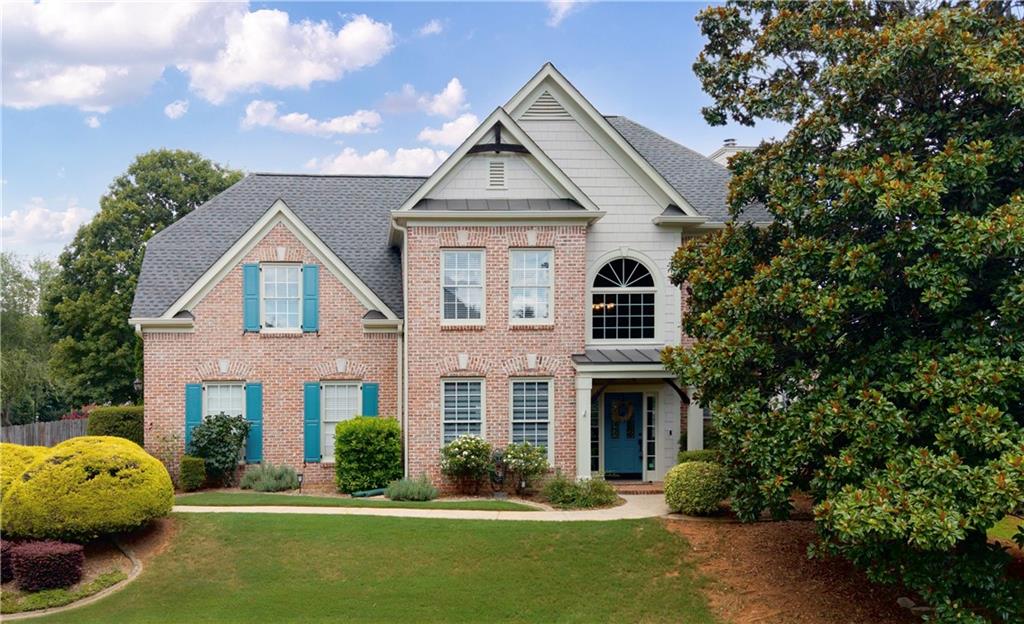 Welcome to 1085 Arbor Creek Drive - where location, lifestyle, and comfort converge in one of Roswell’s most connected and coveted corners. Perfectly positioned between Downtown Roswell, Alpharetta, Avalon, and Milton, this home offers easy access to GA 400, top-rated Milton schools, and beloved local spots. Hembree Park is just a short stroll away, offering tennis courts, playgrounds, walking trails, and open green space. Enjoy a weekend concert at Ameris Bank Amphitheatre, grab dinner at one of the area's award-winning restaurants, or run everyday errands in minutes. Inside, you'll find a classic yet versatile layout featuring hardwood floors throughout the main level, a formal dining room adorned with chair-rail molding, and a separate living room plus fireside family room - perfect for both entertaining and unwinding. The kitchen offers stone countertops, stainless steel appliances, a breakfast bar, and an eat-in breakfast nook, flowing seamlessly into the heart of the home. Upstairs, the spacious primary suite boasts tray ceilings, a walk-in closet, and a private bath with double vanities and a jetted tub, while three additional bedrooms offer plenty of room to spread out. A fenced, level backyard, complete with a patio and enclosed sunroom, provides a private outdoor escape. Nestled on a corner lot, this Arbor Creek home delivers a rare combination of comfort and convenience, ready to welcome you home.