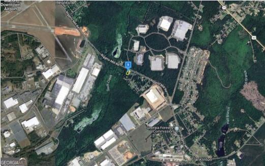 Exciting development opportunity at 5055 Riggins Mill RD, Macon, GA 31217! This land is nestled in the vibrant Riggins Mill area, offering a perfect blend of potential for growth, proximity to educational facilities, and recreational activities, with convenient access to Macon Downtown Airport and the Macon Youth Development Center, in a dynamic and growing community.