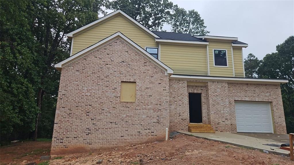 New Construction Home in Gwinnett County – Award-Winning Schools! Welcome to this beautiful 4-bedroom, 2.5-bath new construction home, located in a quiet, established neighborhood in sought-after Gwinnett County. Situated in an award-winning school district and conveniently close to Mall of Georgia and Sugarloaf Mills, this home offers the perfect blend of modern living and everyday convenience.
Step inside to a spacious open-concept layout, where the living, kitchen, and dining areas flow seamlessly—ideal for gatherings and family time. The oversized master suite features a luxurious bathroom and an expansive walk-in closet, creating a serene personal retreat.
With three additional bedrooms, there’s ample space for family, guests, or a home office. Enjoy the charm of a seasoned community with mature trees and a peaceful atmosphere—all while owning brand-new construction.
Currently under construction and nearly complete, this home offers a rare opportunity to enjoy modern design, top-tier schools, and unbeatable access to shopping, dining, and entertainment at two of Gwinnett's premier malls.