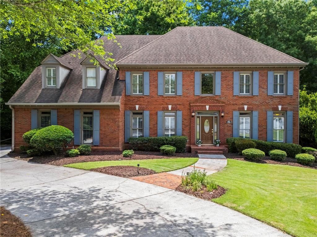 If you love the outdoors, this is the home for you! Situated on a serene half-acre wooded lot with a babbling creek, this stunning 4-sided brick traditional offers three expansive levels of completely private outdoor living—you’ll feel like you’re tucked away in the mountains, right in the coveted Chartwell neighborhood.
Situated on one of the most private cul-de-sac lots, the home boasts a 3-car side-entry garage, a spacious family room with a 2-story stacked stone fireplace, a beautifully renovated kitchen with a large island, stainless steel appliances, generous breakfast area, and access to the covered back porch, as well as a cozy keeping room with gas log fireplace.
The main level also includes a formal dining room and a flexible living room/study with a closet and full bath access—ideal for a guest room or home office.
Upstairs, the enormous primary suite impresses with a tray ceiling, spa-like ensuite featuring dual vanities, whirlpool tub, large shower, and a bonus sitting room/nursery/office, plus private access to the top-floor covered porch. The upper level also offers a versatile loft area and three additional spacious bedrooms—one with a private ensuite, the other two sharing a Jack-and-Jill bath.
The full daylight basement includes a third fireplace and opens to a beautiful brick patio, offering endless potential for customization.
Community & Location:
Chartwell residents enjoy top-notch amenities including a Clubhouse, Pool, Tennis Courts, Pickleball, Lake, and Playground, with path access to Newtown Park, which features over 2 miles of trails, the Veterans Memorial Walk, Park Place Senior Center, Burkhalter Amphitheater, and a 1-acre dog park with turf, sprinklers, and obstacle courses. Newtown Recreation offers a variety of youth sports including soccer, lacrosse, baseball, and adaptive recreation.
This unbeatable location is convenient to top public & private schools, GA-400, Historic Roswell, Avalon, and the Chattahoochee River, with direct access to shopping and dining. 1 year buyer-rate buy down available !