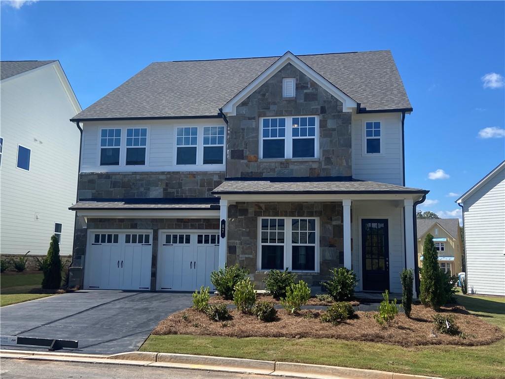 New price reduction! Discover your ideal home in the sought-after Chestatee community, where accessibility meets natural beauty and a lakeside golf course lifestyle. East Harbor II proudly presents the Leyland home plan—a spacious, thoughtfully designed residence offering five bedrooms and four bathrooms, perfect for those who value both functionality and luxury.
From the moment you step inside, the open and light-filled design welcomes you. The main level features a spacious dining room with a butler’s pantry for easy flow to the gourmet kitchen. Here, you’ll find high-end finishes, a large walk-in pantry, and a breakfast area, all opening to the inviting great room with windows stretching across the back of the home. A private guest retreat with a full bath is also conveniently located on the main floor—perfect for visitors or multigenerational living.
Upstairs, the generous primary suite serves as a true retreat, featuring double vanities, a large shower, and a walk-in closet with direct access to the laundry room for everyday convenience. Each secondary bedroom boasts its own walk-in closet with a window, providing abundant storage and natural light.
Practicality meets style with a 2-car garage and adjacent mudroom to keep life organized. Designed for both comfort and entertaining, the Leyland plan seamlessly blends elegance with livability—an exceptional place to call home in Chestatee.
East Harbor 2 at Chestatee offers a slice of luxury within a master-planned community. Highlighted by an award-winning 18-hole golf course designed by Denis Griffiths, Jr., residents enjoy first-class amenities including a clubhouse with dining, a private marina, and a Jr. Olympic pool. The active lifestyle is further supported by tennis and pickleball courts, bocce ball facilities, and a comprehensive trail system for outdoor enthusiasts. The lakeside pavilion and community square foster a strong sense of community through regular social gatherings and events. Additionally, the proximity to North GA Premium Outlets and the University of North Georgia offers convenience and leisure opportunities.
East Harbor 2 seamlessly blends luxury living with the charm and tranquility of Dawsonville, making it an ideal community for those seeking quality, convenience, and a vibrant lifestyle.
This home is Available Now! For further details and information on current promotions, please contact an onsite manager.
Please note that renderings are for illustrative purposes, and photos may represent sample products of homes under construction. Actual exterior and interior selections may vary.