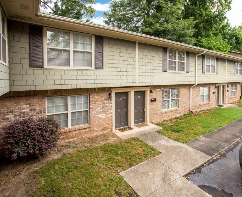 This delightful townhome, convenient to 75/285/Vinings, has been updated and freshly painted throughout & the space has been maximized. Hardwoods greet w/ crown molding in the lg family room, giving way to a breakfast nook at back of home. French doorsleading out to private patio that backs up to woods. Kitchen w/ granite & ss appliances overlooks breakfast nook. Brand new and highlyefficient HVAC system. Sunny master w/ walk in closet & en suite bath w/ wainscoting & tile at front of home & 2nd bedroom w/ it's own bath sit at the back. Washer and Dryer included and located upstairs. We are currently looking for tenants to occupy starting July 31st. Thank you!