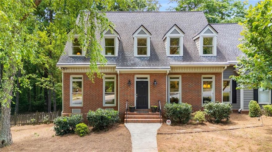 Welcome to 1061 Polo Club Drive—where space, function, and location come together in the heart of Saddlebrook, one of West Cobb’s most desirable swim/tennis communities. Set on a large corner lot with a fully fenced backyard, this spacious and beautifully updated property offers a serene setting for you to call home!  The main level offers a fluid floor plan that allows flexibility to utilize the rooms in a variety of ways that suits your needs.  A beautifully updated eat-in kitchen is light and bright, flows to the eating area and family room providing amazing views to the gorgeous backyard.  With brand new carpet in the family room and living room, you truly won't need to change a thing in this well maintained home.  A screened-in porch and connected deck overlook the backyard creating an ideal setting for relaxed outdoor living year-round.  The upper level has brand new carpet throughout and a spacious primary bedroom with a renovated bathroom featuring double vanities and a large soaking tub that creates a relaxing spa like setting.  Additional bedrooms on the upper level are well proportioned including an oversized ensuite guest room with an attached bathroom.  The finished basement adds even more versatility with an additional bedroom, full bath, and open living space ready to be crafted into a family room, office or gym.  Additional storage space in the basement provides you with ample space to grow into. This home offers the perfect blend of privacy, community, and convenience. Don't miss your chance to make it yours!