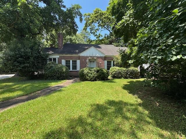 Amazing opportunity in City of Decatur. Excellent location, close to shopping, entertainment, schools, parks. Located adjacent to Wynona Park Elementary. The neighborhood has a great vibe to enjoy. Downtown Decatur and MARTA are within walking distance from the home. The family room has high ceilings and a fireplace; a cosy glassed-in sunroom is tucked in behind the fireplace. Adjacent to the family room is the spacious dining room, which leads into the kitchen, separate laundry room, and the back door. Brick 4 sides, good bones, corner level lot with fenced backyard and attached 2 car garage. A little vision will make this a dream home. It needs renovation but has newer windows, newer A/C and breaker box. Sold As-Is.