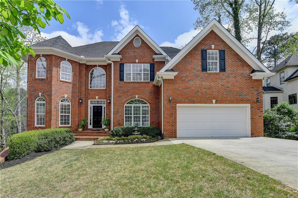 This charming traditional brick home is nestled in a cul-de-sac. As you step into the grand foyer with updated lighting, you're welcomed by a spacious dining room and a versatile bonus living area or main-floor office. The two-story family room features a new light fixture, abundant natural light, and access to a deck that overlooks a private, wooded backyard. This home features neutral paint throughout, a freshly painted exterior (2024), and a restained deck (2024).
The kitchen, open to the family room, showcases stained cabinetry, granite countertops, an island, a pantry, and an eat-in area with deck access—perfect for outdoor entertaining. The main floor also includes a laundry room and a guest room with a full bath.
Upstairs, the expansive owner's retreat offers a fireplace and luxurious ensuite bathroom with a soaking tub, double vanities, a walk-in shower, and a large walk-in closet. Three additional bedrooms provide generous closet space; two share a Jack-and-Jill-style bathroom, while the third has a private ensuite bath.
The terrace level features a full kitchen, three additional bedrooms or flexible bonus spaces, a full bathroom, and a cozy fireside family room that opens to a deck area. It also includes a spacious bonus area, a game room, and abundant natural light. A private entrance provides direct access to the driveway.
This home also boasts a fourth-level sub-basement, currently unfinished, offering potential for additional living space or extra storage.
Conveniently located near shopping, dining, and Newtown Park, this home is part of the Nesbit Lakes community, which offers sidewalks, a pool, tennis courts, pickleball, a clubhouse, a playground, and a scenic lake for fishing or kayaking.