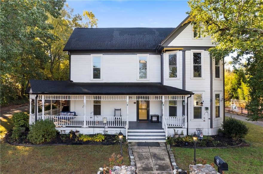 This beautifully renovated historical Victorian home blends timeless charm with modern comfort. Featuring four spacious bedrooms and three and a half baths, including a master suite on the main level with fireplace, this home offers the perfect mix of character and functionality. A welcoming wraparound rocking chair porch sets the tone for the inviting interior. The layout includes a separate formal dining room, a large family room, and an all-new modern kitchen with a large island and a spacious breakfast area. The fourth bedroom offers flexible use as a bonus room or home office, providing versatility to fit your lifestyle.

Inside, the home boasts three fireplaces—two with gas logs and one with a gas heater—adding warmth and charm to the living spaces. New LVP flooring flows throughout, complemented by beautifully updated tile bathrooms. Outside, enjoy an above-ground pool with decking—ideal for entertaining or relaxing—along with a convenient storage building for extra space. This exceptional property perfectly combines classic Victorian character with thoughtful modern updates, all in a prime location minutes from restaurants, shopping, and I-75 *** New Insulated Windows **** HVAC’s 5 Years *** Roof 4 Years *** Affective Age is MUCH NEWER!!