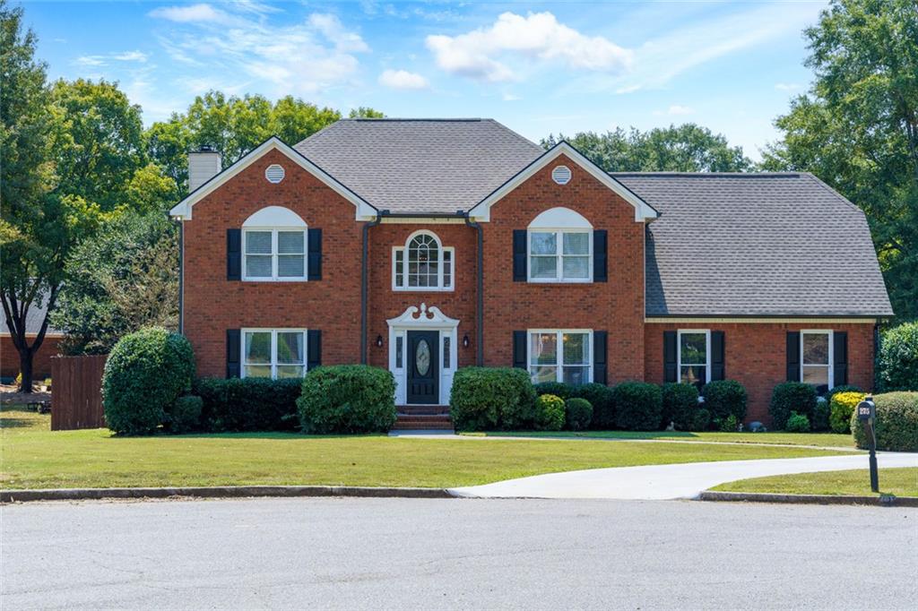 Wonderful 4 bedroom, 2.5 bath home in Cartersville community! This cul-de-sac home in located within walking distance to Cartersville Elementary school and Dellinger Park. Large level lot with covered deck with ceiling fans overlooking the inviting hot tub and salt water inground swimming pool in the fenced backyard. Spacious basketball driveway and two car garage. The eat-in kitchen features built-in cabinetry, a pantry, tile flooring and backsplash, stainless steel appliances include an electric range, refrigerator, microwave, dishwasher, disposal and tankless water heater. Separate dining room with hardwood flooring. Separate living room. Great room with fireplace, built-in cabinets and hardwood flooring. Upstairs you will find the four spacious bedrooms and two full bathrooms. The spacious primary bedroom features a ceiling fan. Enter the spa primary bathroom with built-in cabinets, large vanity, tile shower and soaking tub. Laundry room offers built-in cabinets. Golf cart friendly area near downtown Cartersville which offers delicious restaurants and stores.