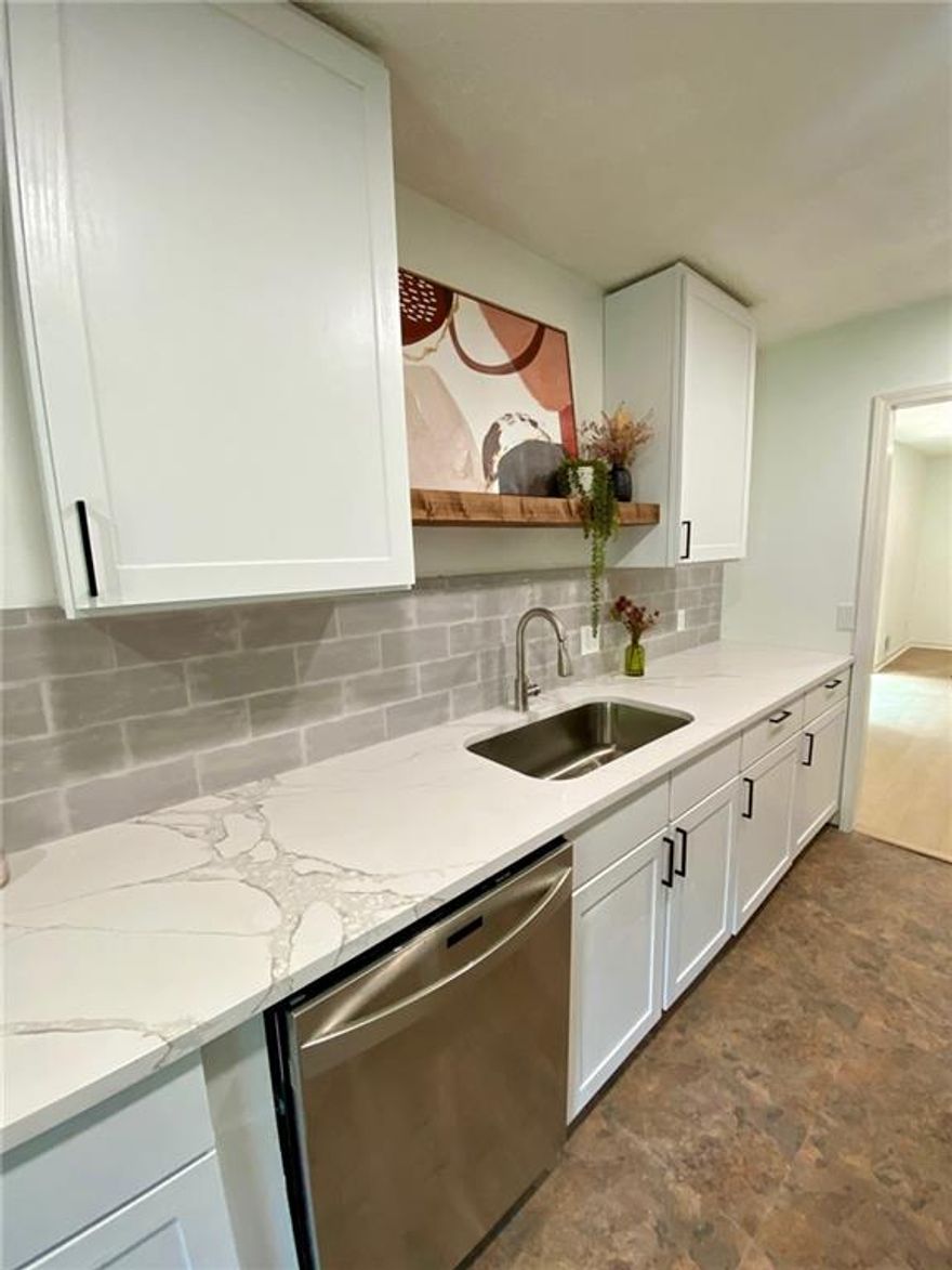Beautifully remodeled 4 bedroom 3 bath ranch on gorgeous tree-lined street in top-notch school district. Close to shopping, restaurants, hiking and more.  Large, flat, fenced-in yard with stone firepit area.  Maple cabinets, quartz countertops, stainless steel appliances, soft close drawers and doors, pantry with pull out drawers. Luxury flooring throughout.  Large, vaulted sun room flooded with light.  Covered front porch and wood deck. Large unfinished basement.  Priced to sell.  View it before it's gone!