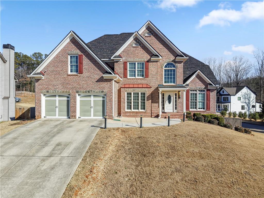 Discover your dream home in this stunning 6-bedroom, 4-bathroom retreat, nestled in a peaceful neighborhood with no HOA and surrounded by newly built homes. Recently painted and thoughtfully designed, this property offers the perfect blend of elegance, comfort, and functionality.
The grand two-story foyer leads to formal sitting and dining areas, ideal for hosting. Gorgeous hardwood floors flow throughout the main level, where the heart of the home shines in the chef’s kitchen. Enjoy granite countertops, stainless steel appliances (including double ovens), a large island, and a cozy breakfast nook. A main-level bedroom with a full bath is perfect for guests.
Step outside to a nearly new screened-in porch overlooking the spacious, flat backyard—ideal for entertaining, relaxing, or even adding a pool. Upstairs, the oversized primary suite features tray ceilings, a sitting room, a spa-like ensuite with dual vanities, a soaking tub, a separate shower, and a custom walk-in closet. Two additional bedrooms with walk-in closets share a Jack-and-Jill bath.
The fully finished basement offers endless possibilities: a large game room, an in-law suite with a kitchen, three flexible bonus rooms for a home theater or gym, and an extra bedroom with a full bathroom.
A covered back deck, double-car garage, and convenient access to interstates, shopping, and dining complete this home. Move-in ready and designed for making lasting memories—schedule your showing today!