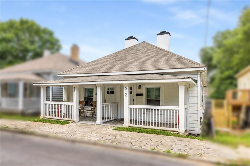 Welcome to 512 Old Wheat Street, a charming and fully renovated duplex nestled in the heart of Atlanta’s vibrant Old Fourth Ward. This shotgun-style property features two stepless-entry, one-bedroom, one-bathroom units—each thoughtfully updated with modern finishes while preserving historic character. With inviting front porches, updated kitchens with stainless steel appliances, in-unit laundry, and stylish tile bathrooms, this turnkey property offers a comfortable and appealing space for tenants or owner occupants alike. Currently listed on short-term rental platforms, it is ready to generate immediate income.
Located just blocks from the Atlanta BeltLine, Krog Street Market, Edgewood Avenue nightlife, and the Sweet Auburn district, 512 Old Wheat sits in one of the city’s most walkable and culturally rich neighborhoods. You're also steps from the historic Martin Luther King Jr. National Historical Park, multiple award-winning restaurants, and local festivals that keep the area buzzing year-round. Zoned for Hope-Hill Elementary, David T. Howard Middle School, and Midtown High, this property is ideal for investors seeking a high-demand rental location or savvy buyers looking for the ultimate house hack—live on one side and rent out the other. Best of all, the home offers an assumable 2.2% mortgage, making it a rare opportunity to secure both a hip lifestyle and financial win in one of Atlanta’s most iconic communities.
