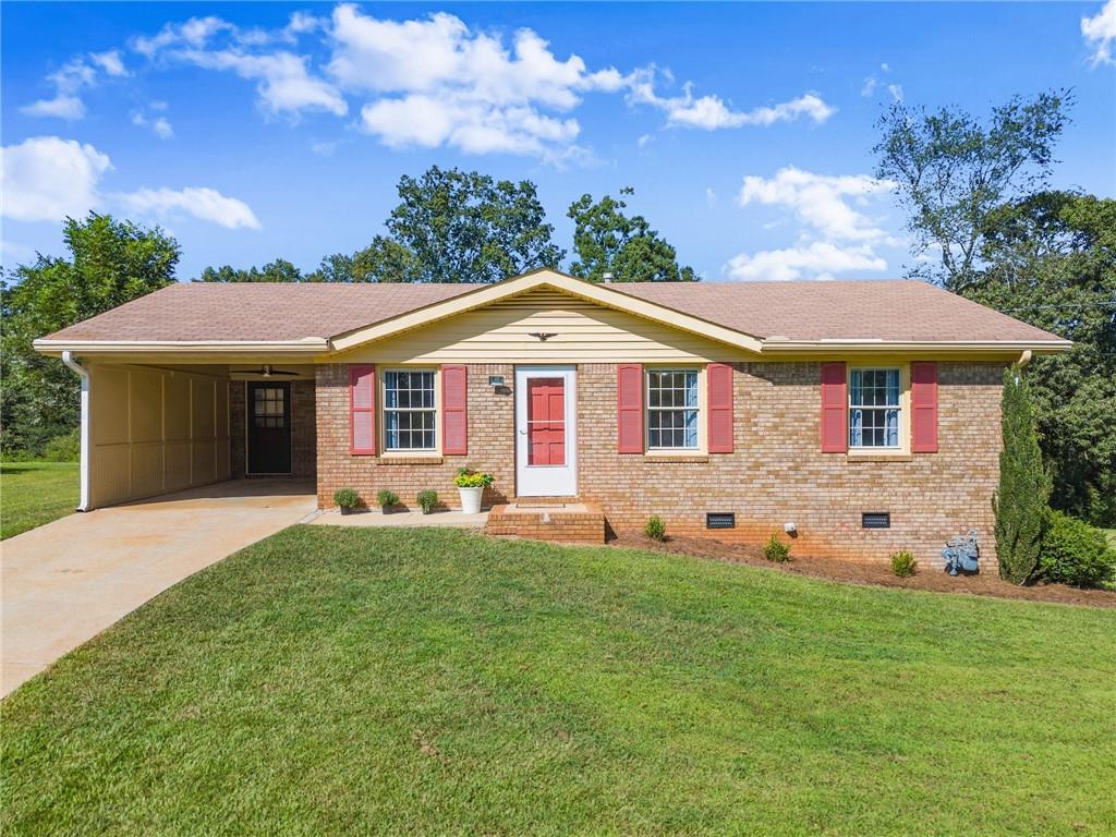 Beautiful Brick Ranch on .63 Acres in Flowery Branch – No HOA! Finally, an affordable, charming
3-bedroom, 1-bath brick ranch, with a large bonus sunroom on a level .63-acre lot in a quiet, established
neighborhood in desirable Flowery Branch. This property built and lived in by original owner offers
privacy, convenience, and freedom with no HOA restrictions.
Recent updates include freshly painted interior and exterior doors and shutters, new vents, light plates,
and light fixtures. Brand-new flooring in the kitchen, sunroom, and bathroom, creating a clean and
inviting feel throughout. New water heater 2023.
The spacious sunroom adds flexibility to fit your lifestyle—perfect to convert as a home office,
playroom, recreation room, or a relaxing retreat with peaceful views of the expansive backyard and
wooded area beyond.
Outdoor the level lot provides endless potential—whether you dream of gardening, creating outdoor
living spaces, or simply enjoying nature.
This home is a rare find, offering the best of quiet living while still being close to shopping, dining and
easy access to I-985. Convenient to Platt Park that offers pickle ball and basketball courts, playgrounds,
ball fields, pavilion/tables, and more.