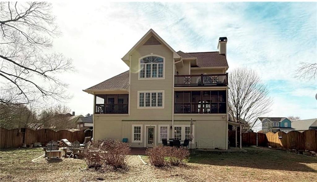 This Craftsman, 3 story home in Clarkesville sits on the banks of the Soque River, offering the perfect blend of luxury and natural beauty. The grand two-story living room with a centered fireplace is the first of many stunning features. The open floor plan flows seamlessly into the eat in kitchen, which boasts ample cabinetry, a walk-in pantry, and solid surface countertops. A picture window dining area allows you to take in the peaceful backyard setting, while an under-roof screened porch conveniently connects the dining and living areas, creating the perfect outdoor living space. The master bedroom, located on the main floor, features a tray ceiling and its own private screened-in porch, offering privacy and a peaceful retreat. The master ensuite bath offers a soaking tub, double vanities and a standalone shower. Take the elevator or stairs to the second floor, where you'll find two large bedrooms, one with an observation deck to further enjoy the stunning views and a full bath. The expansive basement on the ground floor includes a spacious living area, another full bath, with endless possibilities. From the basement walk out to the backyard patio, fire pit and access to the Soque River. All of this is nestled within the privacy of a gated community, complete with a walking path, and just an easy walk to downtown, where you'll find charming restaurants and shopping. This is a rare find!