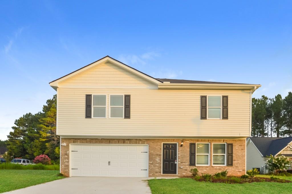 Do not miss out on this like-new home in the highly desireable Alcovy High School district. Located in a quiet neighborhood with easy access to the historic Covington Square. Step inside to the open floorplan main level with large living room and kitchen. Kitchen boasts stainless steel appliances for your modern feel and culinary needs. The main level also has a convenient half bathroom as well as full laundry room. Up the stairs, you'll find all of the bedrooms. The primary suite has plenty of space. Primary bathroom features double vanity, shower/tub combo, and a large walk-in closet. All of the other bedrooms are also generously sized and have a shared full bathroom in the hall, also with double vanity. The large backyard is perfect for your summer activities!