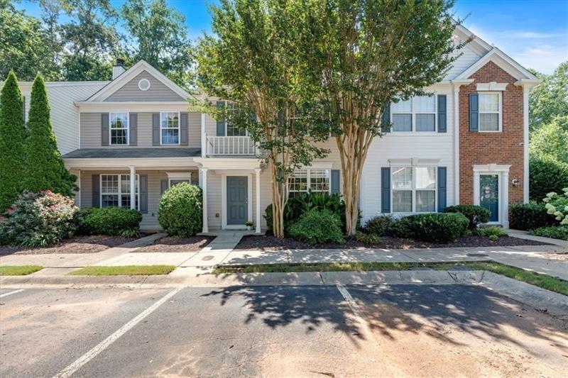 Welcome to this beautifully maintained 3 bedrooms, 2.5 bath townhome located in one of Alpharetta’s most desirable communities. Offering the perfect blend of style, comfort, and convenience, this home is filled with natural light and thoughtful updates throughout. The main level features an open-concept layout with a spacious kitchen showcasing granite countertops, stainless steel appliances, and a cozy breakfast nook. The dining area flows seamlessly to a private patio through secure double French doors with built-in blinds, overlooking a peaceful wooded backdrop perfect for outdoor dining or relaxing. A convenient outdoor storage room adds extra functionality. Freshly painted throughout, the interior feels bright and inviting. Upstairs, you'll find new flooring and a spacious primary suite complete with a large walk-in closet and private bath. Two additional bedrooms share an updated full bath and a convenient laundry room. Situated in a top-rated school district and just a few minutes from Downtown Alpharetta, Avalon, Windward Parkway, GA-400, shopping, dining, and parks, this home offers unmatched convenience in a serene setting. New Roof and Gutters (2023) and New HVAC (2024). A rare opportunity to own a beautifully updated townhome in the heart of Alpharetta.
