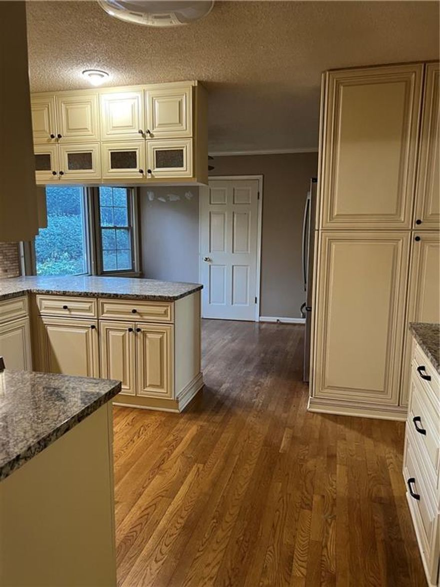 Beautiful Lease Opportunity in sought-after Weatherstone Swim/Tennis community. Large 5 bedroom/ 3 bath Ranch with 4 bedrooms on the main floor and another bedroom in the finished basement that could be an in-law suite. Beautifully updated bathrooms and gorgeous kitchen with custom cabinetry. Stainless steel appliances, granite counters, and attractive backsplash make for a Foodies dream! Large family room opening to vaulted 4-season sunroom with beautiful wood walls and loads of windows. Original hardwood floors in living areas. Large Laundry Room right off of kitchen. Tremendous storage space in the basement. Beautiful lot with fenced backyard. Perfect for a large family or multi-generational family.