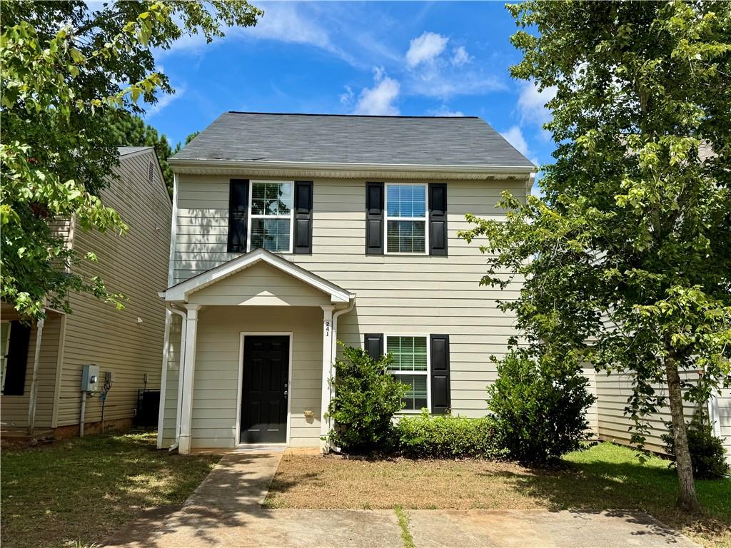 In the heart of McDonough, this 3 bedroom 2 and a half bath home is conveniently located to dining, shopping, entertainment and I-75. Walk in to the spacious family room with electric fireplace that leads to a bright dining space and open kitchen with stainless steel appliances and granite countertops. Convenient half bath and storage closet on the main level. Outside you have a covered patio and low maintenance yard space, plus 2 storage closets on either side of the home. Upstairs, the spacious primary bedroom has a ceiling fan, large closet and ensuite bathroom, 2 additional large bedrooms and another full bathroom, beautiful bronze lighting and plumbing fixtures, durable wood plank flooring throughout entire home. Neighborhood features a small park with benches, basketball courts and pool.